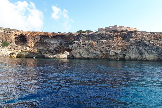 2 hour Private Boat Adventure Tour of Comino and Blue Lagoon - Santa Maria Bay: Quiet Water, Old Police Station, and Boat-Only Caves