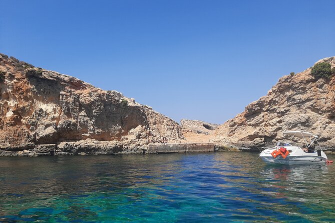 Boat Charters Blue lagoon, Crystal Lagoon, Comino, Malta 4hr trip - St Mary’s Tower, Saint Mary’s Battery, and Elephant Head Rock from the sea