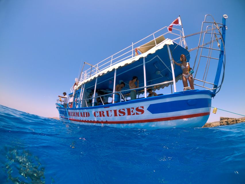 Bugibba: Scenic Sunset Cruise with Blue Lagoon Swim Stop - Checking in at Bugibba Jetty and meeting the Mermaid team