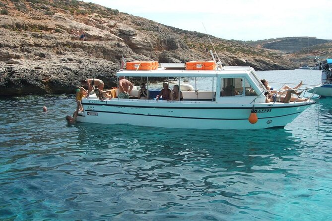 Comino and Gozo Private Boat Tour : Julie Pearl Boat - Cruising Gozo South Coast: Qala, Tal-Halfa, Hondoq Bay, and Bemberin Gorge