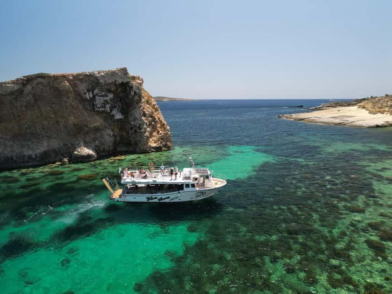 Comino Blue Lagoon & Crystal Lagoon - 3 Bay Cruise - What’s on board: toilets, showers, bar snacks, and small conveniences