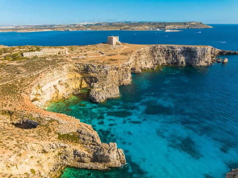 Comino: Blue Lagoon, Crystal Lagoon and Sea Caves Boat Tour - Gozo views and Promising Rock (Gebla tal-Halfa): quick photos, good context