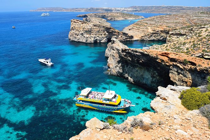 Comino Island: including Blue Lagoon, Crystal Lagoon & sea caves - Blue Lagoon: the famous stop, with waterslides and a mooring base