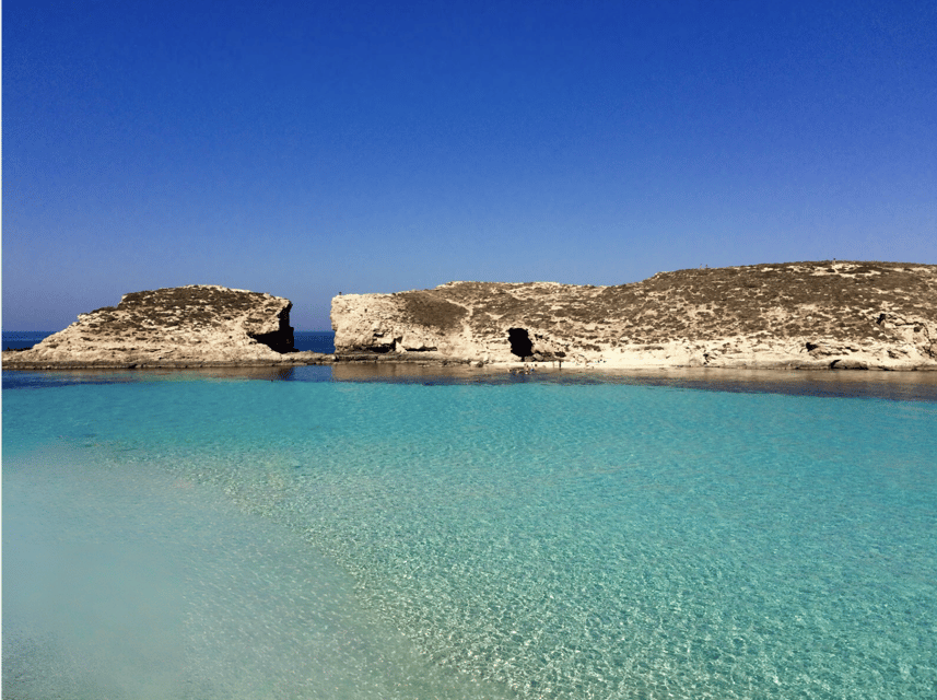Comino's Best in a Flash: Caves, Coves & Beaches Boat Tour - Picking Mgarr or Cirkewwa Without Regret