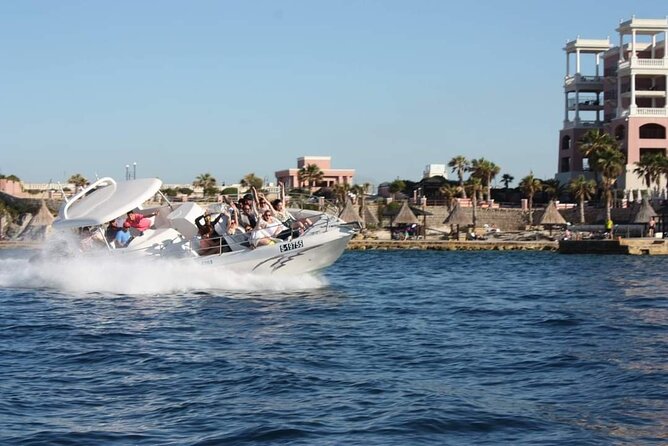 Comino, The Blue Lagoon & Caves Powerboat from St Julian's - Passing St Paul’s Islands: the quick “wow” before Comino