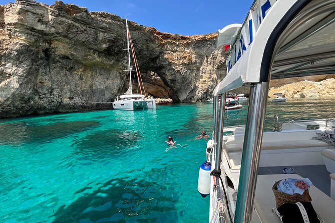 Explore Comino, Blue Lagoon & Caves - Private speed boat - Half Rock and Gozo scenery: a swim stop with a wider feeling