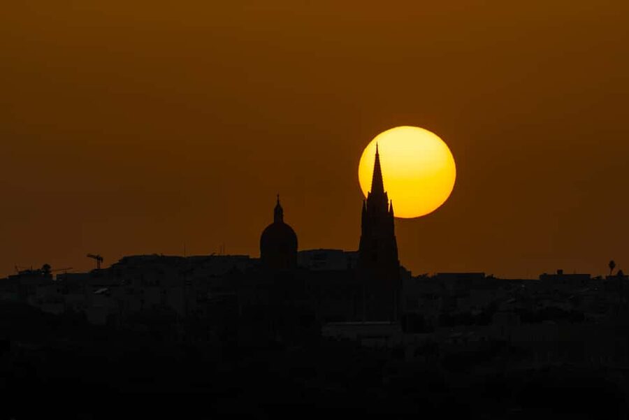 From Bugibba: Blue Lagoon Sunset Cruise - Exploring Comino after dark: walking, photos, and starry-sky views