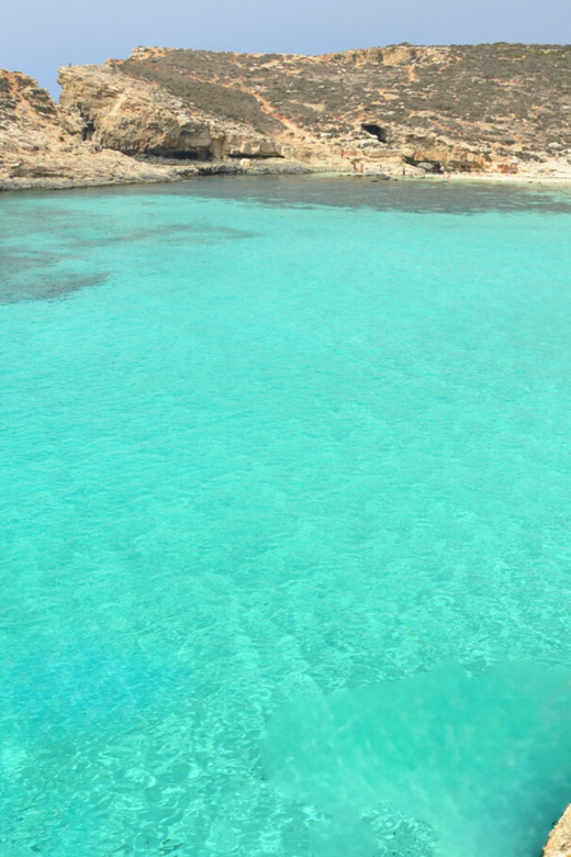 From Malta/Gozo: Comino & Crystal Lagoon Private Boat Trip - Crystal Lagoon swim stop: clear water, short time, big payoff