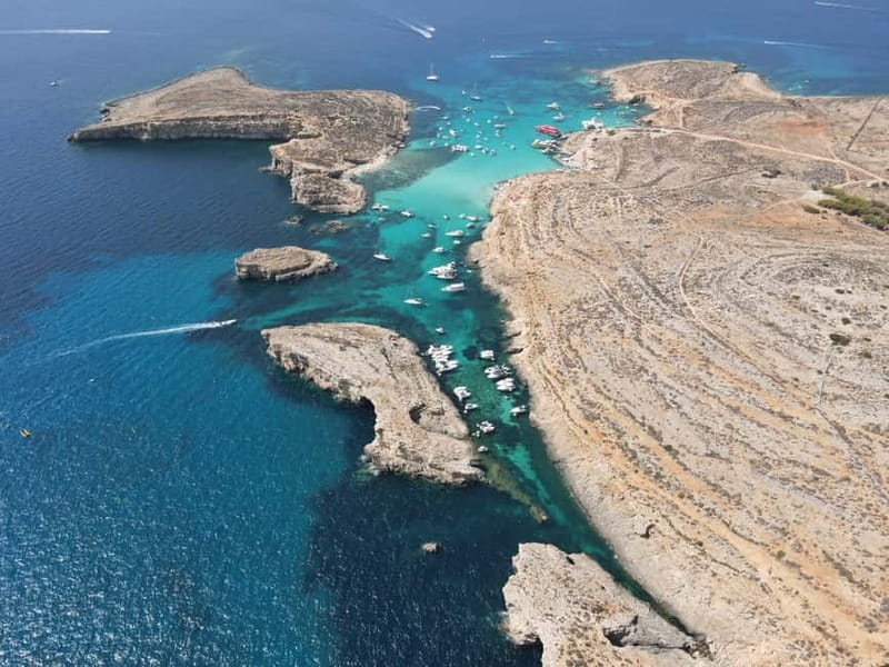 From Sliema: Comino, Crystal Lagoon, and Blue Lagoon Cruise - Crystal Lagoon or St. Nicholas Bay (seasonal): where the water steals the plan