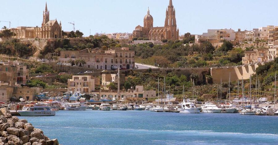 From Sliema or Bugibba: Gozo Heritage Day Pass - City Sightseeing Gozo buses: two routes, 15 stops, and a timing reality