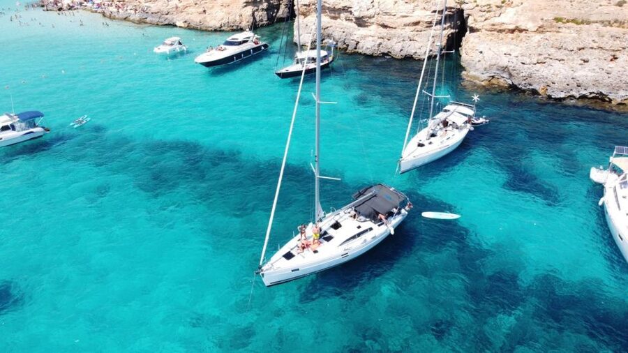 From Valletta: Full Day Private Charter on a Sailing Yacht - Blue Lagoon style swimming: why the first swim stop is usually the best mood-setter