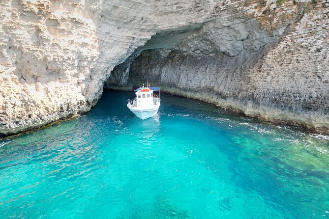 Half Day Blue Lagoon, Comino, Gozo and Malta Private Boat Trip - Santa Maria Caves: limestone scenery and guided passes