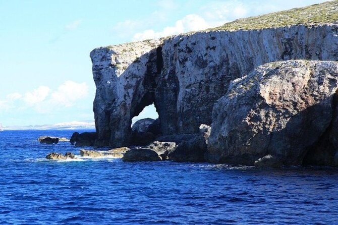 Half Day Malta Tour to Gozo Comino and Blue Lagoon Caves - Gozo Harbour photos and Comino bays you see from the boat