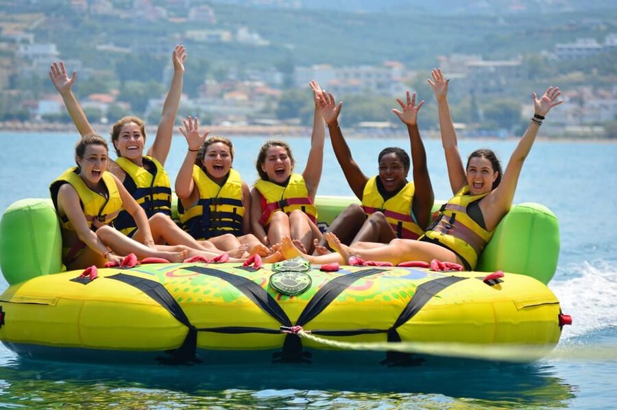 Malta: Boat Party + Watersport+ Comino+ OpenBar ALL INCLUDED - Popeye Village at sunset: a scenic finish without the late-night risk