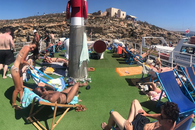 Malta: Comino, Blue Lagoon & Caves - swim, snorkel & slide - Setting off from Bugibba Jetty, then easing into the route