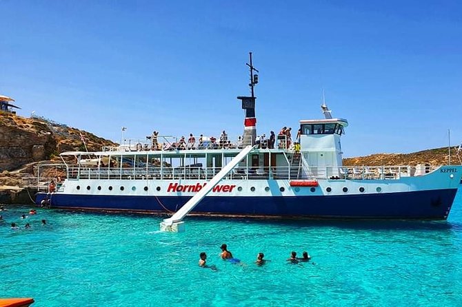 Malta: Comino, Blue Lagoon & Caves - swim, snorkel & slide - Crystal Lagoon and that 8-minute walk option