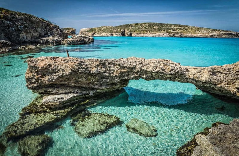 Malta: Comino, Gozo, Blue & Crystal Lagoon, and Caves Cruise - Crystal Lagoon and cave cruising: Popeye and Lovers from the water