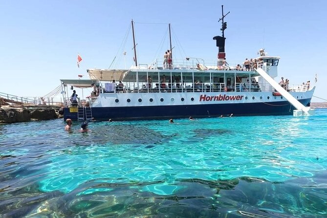 Malta: Comino, Gozo, Blue Lagoon, Crystal Lagoon and Caves Tour - Crystal Lagoon cruising: why divers like this side of Comino