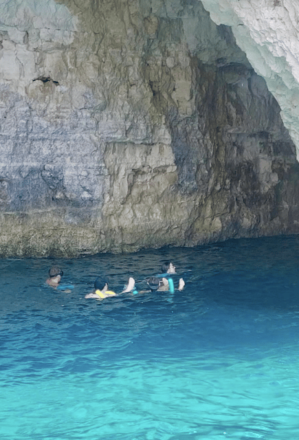 Malta: Comino Island Private Boat - The boat experience: canopy shade, sun deck comfort, and gear included