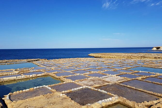 Malta: Gozo Full Day Buggy Tour with lunch and Comino Stop - Dwejra Bay: Cliffs, Cave Area Views, and Optional Boat Minutes