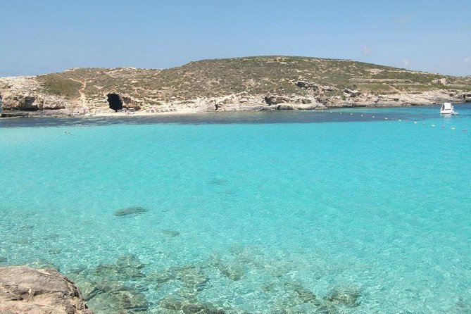 Malta Private Charter from Mellieha: Gozo, Comino, Blue Lagoon - Santa Marija Bay on Comino: quieter sand, plus a strong snorkeling pocket