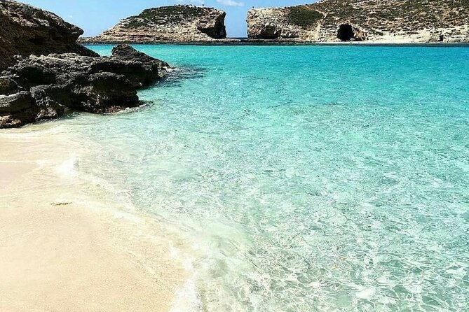 Malta Sunset Boat Tour: Bugibba to Comino Blue Lagoon Cruise - Upper deck comfort, full bar vibes, and the 10m slide factor