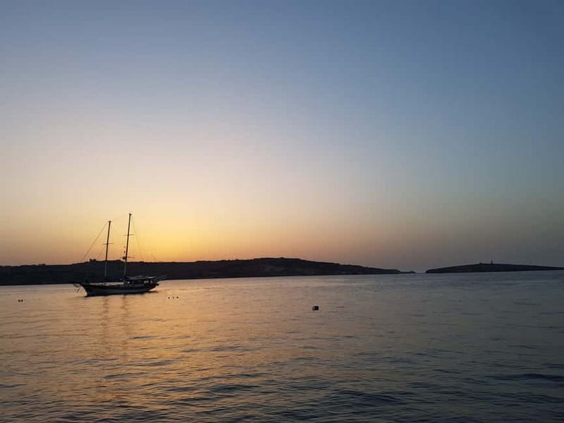 Malta: Sunset Cruise to Blue Lagoon and Caves - Photo stop, then the Blue Lagoon: how the trip builds to the moment