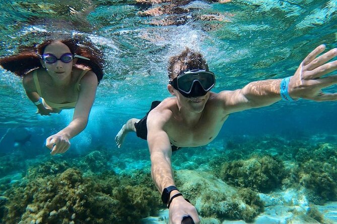 Mellieha: Gozo, Comino, Sea Caves, and Blue Lagoon Cruise - Crystal Lagoon stop: caves you can actually swim around