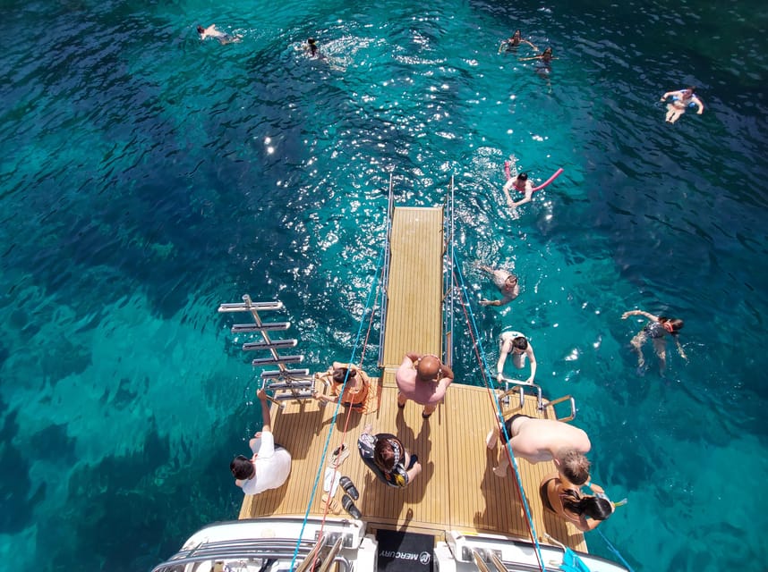 Mellieha: Two Bay Evening Cruise Including The Blue Lagoon - Stop 2, Blue Lagoon: turquoise water, snorkeling time, and the ashore rule