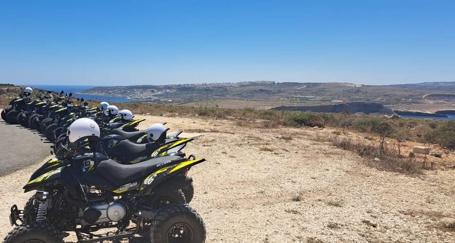 North Malta: Quad Bike Tour with Scenic Land, Sea & Swimming - Armier Bay swim break when weather permits