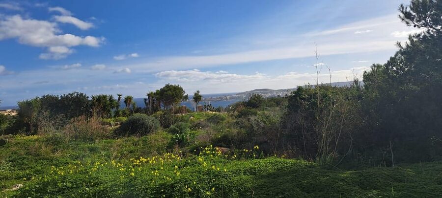 North Malta: Quad Bike Tour with Scenic Land, Sea & Swimming - Mellieha village centre and the square before heading back
