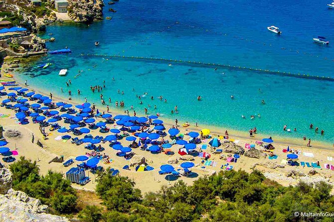 Private Boat Tour Experience with Snorkeling Blue Lagoon and Comino - Boat comforts, shade, and what to pack for a hot day