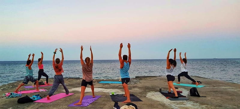 Sliema: Beach Yoga Class with Swimming - The 75 Minutes: Breath, Sun Salutations, Poses, Relaxation