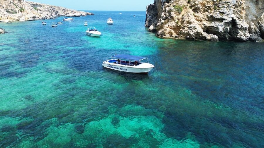 Sliema: Boat Trip to Comino Blue Lagoon, Gozo, and Caves - Ħalfa Rock in Gozo swim, a second water hit with a different mood