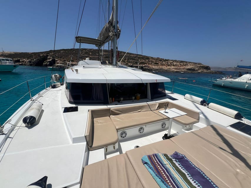 St. Paul's Bay: Half-Day Luxury Catamaran Tour with Drinks - Santa Maria Caves stop: the quick hit that looks best from the water