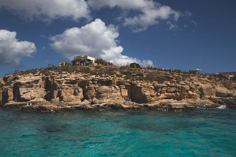 St Pauls: Gozo & Comino Islands, Blue Lagoon & Seacaves Tour - Comino Dock Time: 1 Hour on Foot Plus Water Views