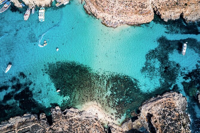 Turkish Gullet Cruise to Gozo and Comino with Lunch and Transfers - Open-Water Bay Near Gozo: Lunch Time and a Less Crowded Feel