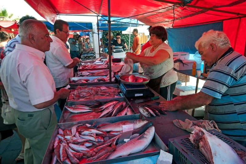 Visit Tarxien Temples, Kalanka Bay, Blue Grotto, Marsaxlokk - Marsaxlokk Market on the Seafront: Luzzu Boats and Real-Day Fishing